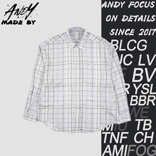 As A Light Gray Plaid Long-sleeved Shirt With A Bow