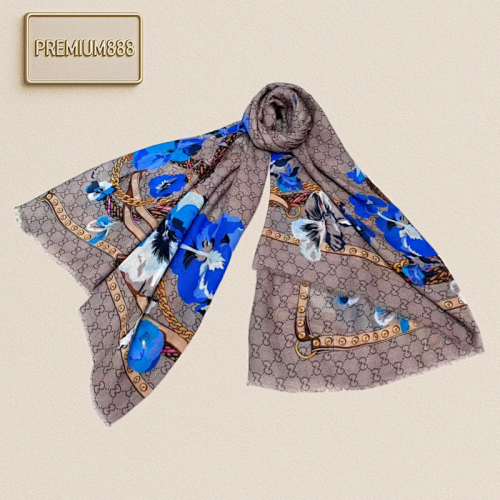 Gucci's Classic Double G Logo Is Paired With Floral Elements Which Permeates The Temperame