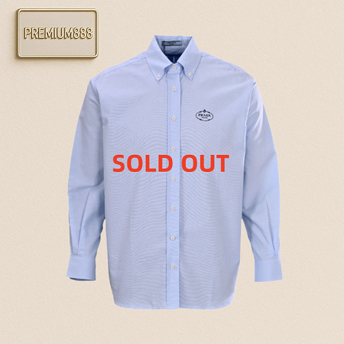 Prada Prd Round-label Embroidered Long-sleeved Shirt