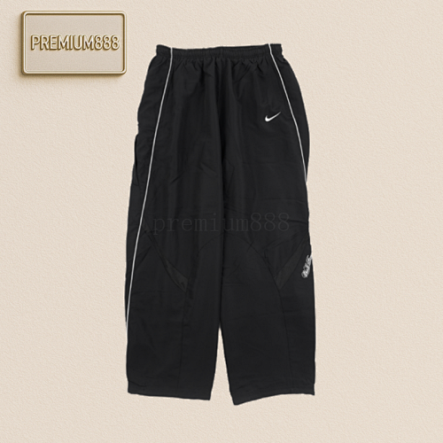 Supreme Sup 25ss Co-branded Swoosh Patterned Trousers