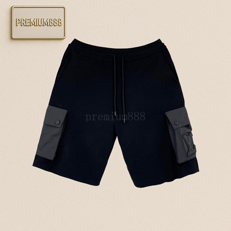 L V Embossed Patch Shorts