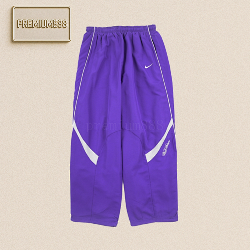 Supreme Sup 25ss Co-branded Swoosh Patterned Trousers