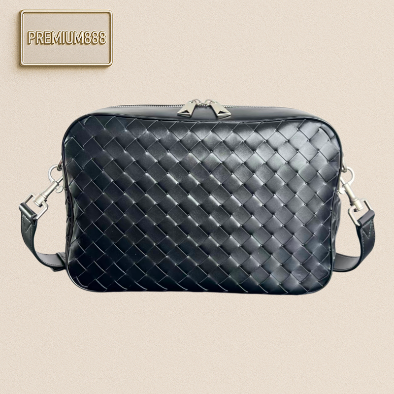 Bottega VENETA's New Men's Medium-sized Intrecciato Woven Camera Bag. The Leather Has A So