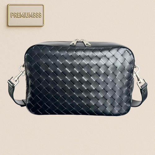 Bottega VENETA's New Men's Medium-sized Intrecciato Woven Camera Bag. The Leather Has A So