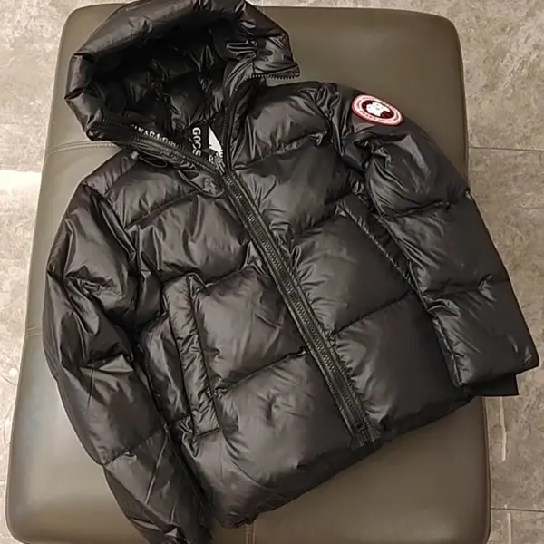 Down jacket with arm badge, Canada Goose style